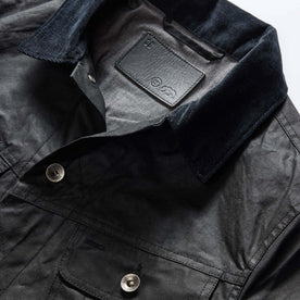 material shot of the collar on The Long Haul Jacket in Coal Waxed Canvas, Outerwear by Taylor Stitch