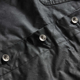 material shot of the buttons on The Long Haul Jacket in Coal Waxed Canvas, Outerwear by Taylor Stitch