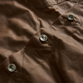 material shot of the buttons on The Long Haul Jacket in Dark Khaki Waxed Canvas, Outerwear by Taylor Stitch