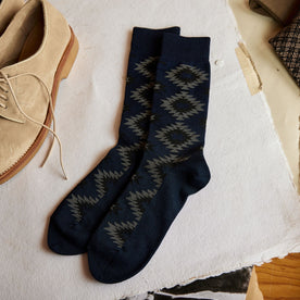 The Crew Sock in Navy Kilim on table, Accessories by Taylor Stitch