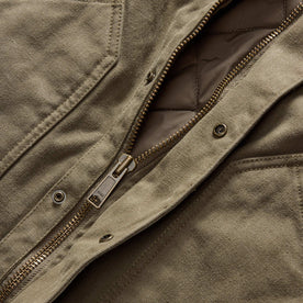 material shot of the YKK zipper on The Workhorse Jacket in Stone Boss Duck, Outerwear by Taylor Stitch