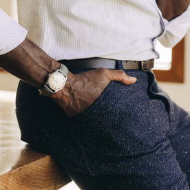 fit model with his hand in the pocket of The Camp Pant in Navy Nep Wool, Bottoms by Taylor Stitch