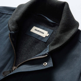 material shot of the collar on The Deck Jacket in Dark Navy Dry Wax, Outerwear by Taylor Stitch