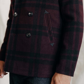 fit model showing the side pockets and horn buttons on The Mariner Coat in Port Plaid Wool, Outerwear by Taylor Stitch