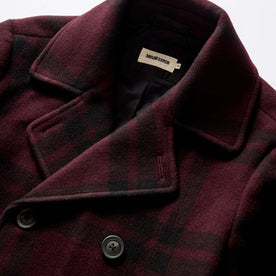 material shot of the double breasted front on The Mariner Coat in Port Plaid Wool, Outerwear by Taylor Stitch