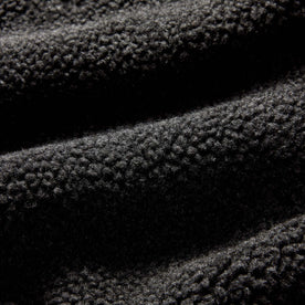 material shot of the fleece on The Nomad Pullover in Charcoal Heather Sherpa, Knits by Taylor Stitch