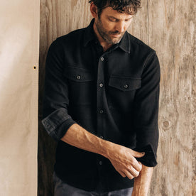 fit model adjusting the sleeves in The Point Shirt in Coal Sashiko, Wovens by Taylor Stitch