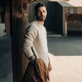 fit model showing the side of The Seafarer Sweater in Natural Donegal, Knits by Taylor Stitch