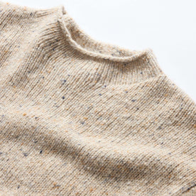 material shot of the mock neck collar on The Seafarer Sweater in Natural Donegal, Knits by Taylor Stitch