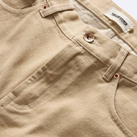 material shot of the button fly on The Slim All Day Pant in Light Khaki Broken Twill, Bottoms by Taylor Stitch