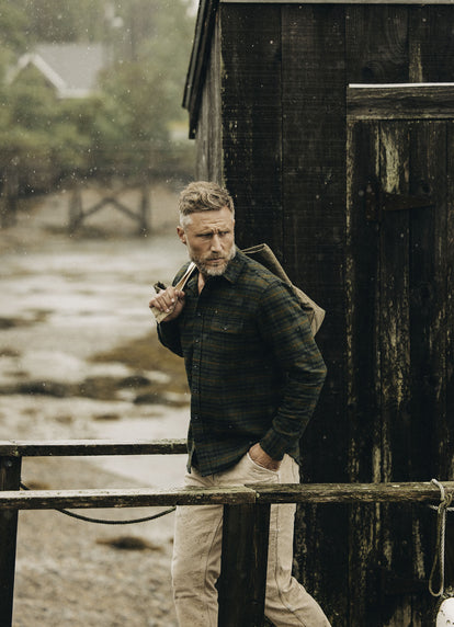 Model walking in The Yosemite in Dark Forest Plaid