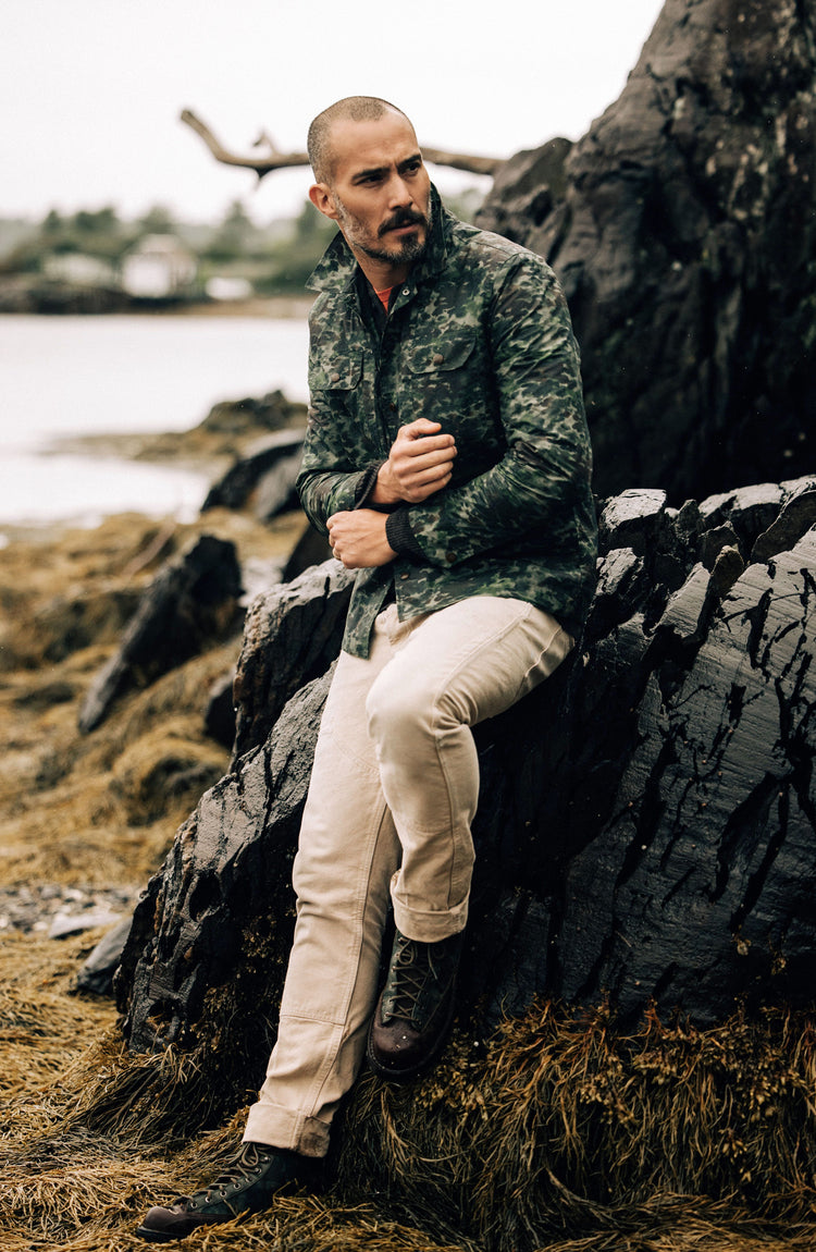 Model wearing The Venture Jacket in Camo Dry Wax