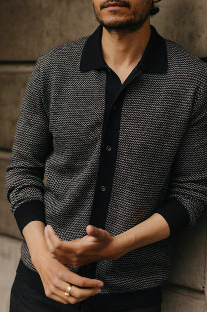 Model showing the birdseye texture on The Nichols Polo Sweater