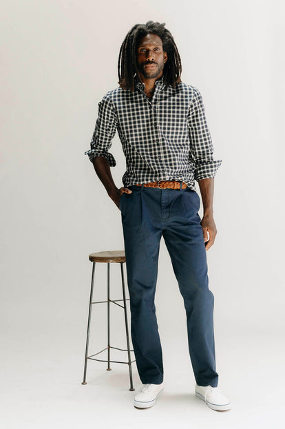 Model posing in The Jack in Deep Blue Plaid and The Matlow Pant