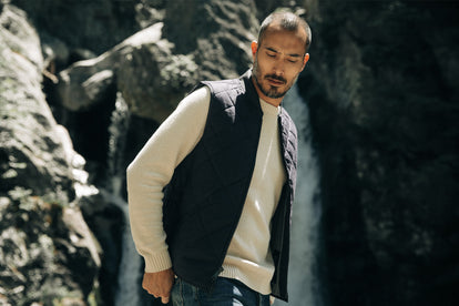 Model wearing The Quilted Bomber in Navy Dry Wax