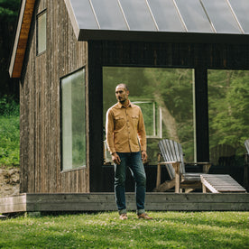 fit model standing in The Yosemite Shirt in Tan, Wovens by Taylor Stitch