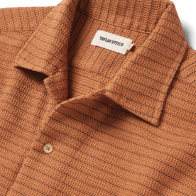 material shot of the collar of The Short Sleeve Hawthorne in Rust Pickstitch Waffle, Wovens by Taylor Stitch