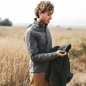 The fit model in a field , Outerwear by Taylor Stitch