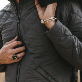 Close up shot of our fit model wearing the vertical jacket , Outerwear by Taylor Stitch