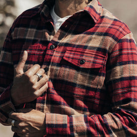 close up of fit model buttoning the cuffs on The Crater Shirt in Cardinal Check, Wovens by Taylor Stitch