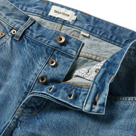 material shot of the button closures on The Democratic Jean in Patch Wash Selvage, Bottoms by Taylor Stitch