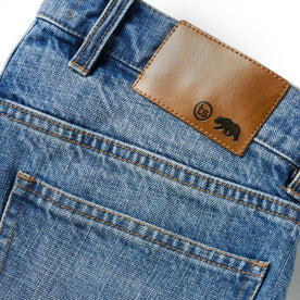 material shot of the leather patch on The Democratic Jean in Patch Wash Selvage, Bottoms by Taylor Stitch