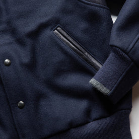 material shot of the pockets on The Golden Bear Snap Bomber in Midnight Wool, Outerwear by Taylor Stitch