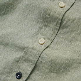 material shot of the buttons on The Short Sleeve California in Army Hemp, Wovens by Taylor Stitch