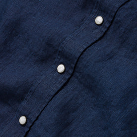 material shot of the buttons on The Short Sleeve Western in Indigo Linen, Wovens by Taylor Stitch