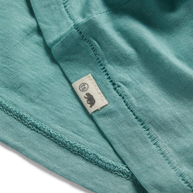 material shot of the TS label on The Cotton Hemp Tee in Teal, Knits by Taylor Stitch