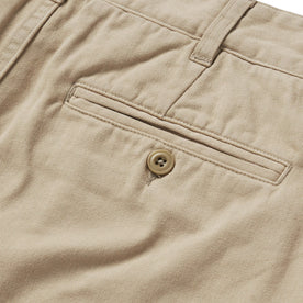 material shot of the back pocket on The Foundation Short in Khaki Twill, Bottoms by Taylor Stitch