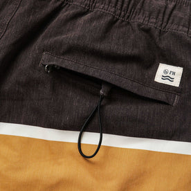 material shot of the rear pocket on The Bayberry Trunk in Sandbar, Bottoms by Taylor Stitch