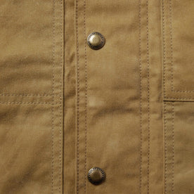 material shot of the buttons on The Lined Longshore Jacket in Harvest Tan Waxed Canvas, Outerwear by Taylor Stitch