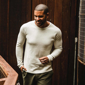 our fit model wearing The Heavy Bag Waffle Long Sleeve in Natural, Knits by Taylor Stitch