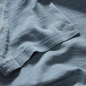 material shot of the sleeve on The Organic Cotton Tee in Dyed Indigo, Knits by Taylor Stitch