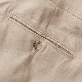 material shot of the back welted pocket on The Sheffield Trouser in Natural Linen, Bottoms by Taylor Stitch