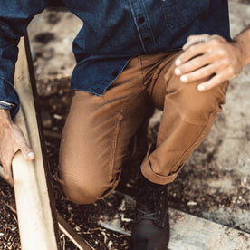 The fit model in his chore pants, Pants by Taylor Stitch