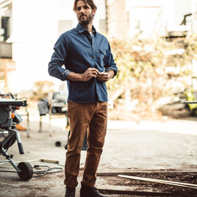 Danny in the chore pants working in his garage, Pants by Taylor Stitch