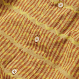 material shot of the buttons on The Short Sleeve Hawthorne in Gold Wave, Wovens by Taylor Stitch