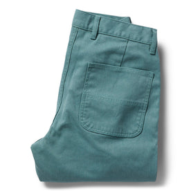 flatlay of The Chore Pant in Ocean Boss Duck, shown folded, Bottoms by Taylor Stitch