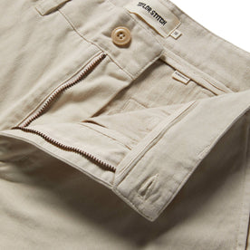 material shot of the open zipper fly of The Democratic Foundation Pant in Organic Stone, Bottoms by Taylor Stitch