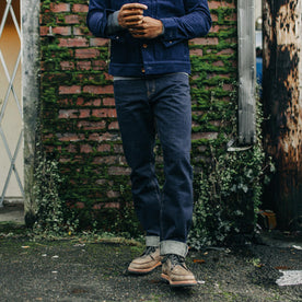 fit model wearing The Democratic Jean in Rinsed Organic Selvage, Bottoms by Taylor Stitch