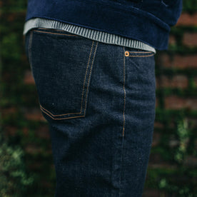 fit model showing back pocket of The Democratic Jean in Rinsed Organic Selvage, Bottoms by Taylor Stitch