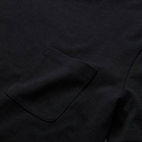 material shot of the pocket detail on The Heavy Bag Tee in Black, Knits by Taylor Stitch