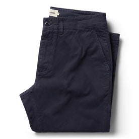 folded flatlay of The Slim Foundation Pant in Dark Navy, Bottoms by Taylor Stitch