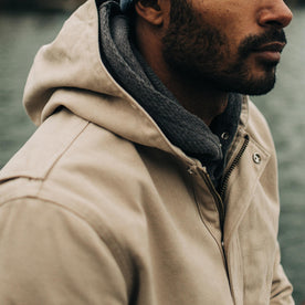 fit model wearing The Workhorse Hoodie in Sand Boss Duck with the hood down, Outerwear by Taylor Stitch