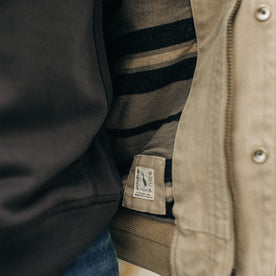 fit model showing the interior pattern detail of The Workhorse Hoodie in Sand Boss Duck, Outerwear by Taylor Stitch