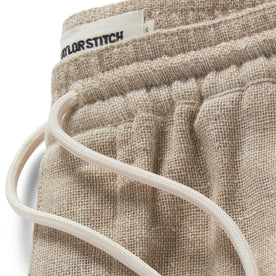 material shot of the drawstring of The Apres Pant in Oat Donegal, Bottoms by Taylor Stitch