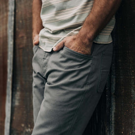 fit model showing the side of The Camp Pant in Gravel Boss Duck, Bottoms by Taylor Stitch