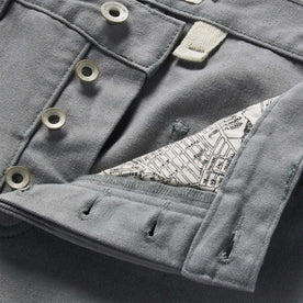 material shot of button fly on The Camp Pant in Gravel Boss Duck, Bottoms by Taylor Stitch